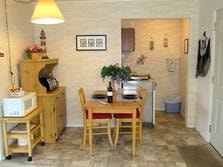 Cozy kitchen and dining nook with warm lighting