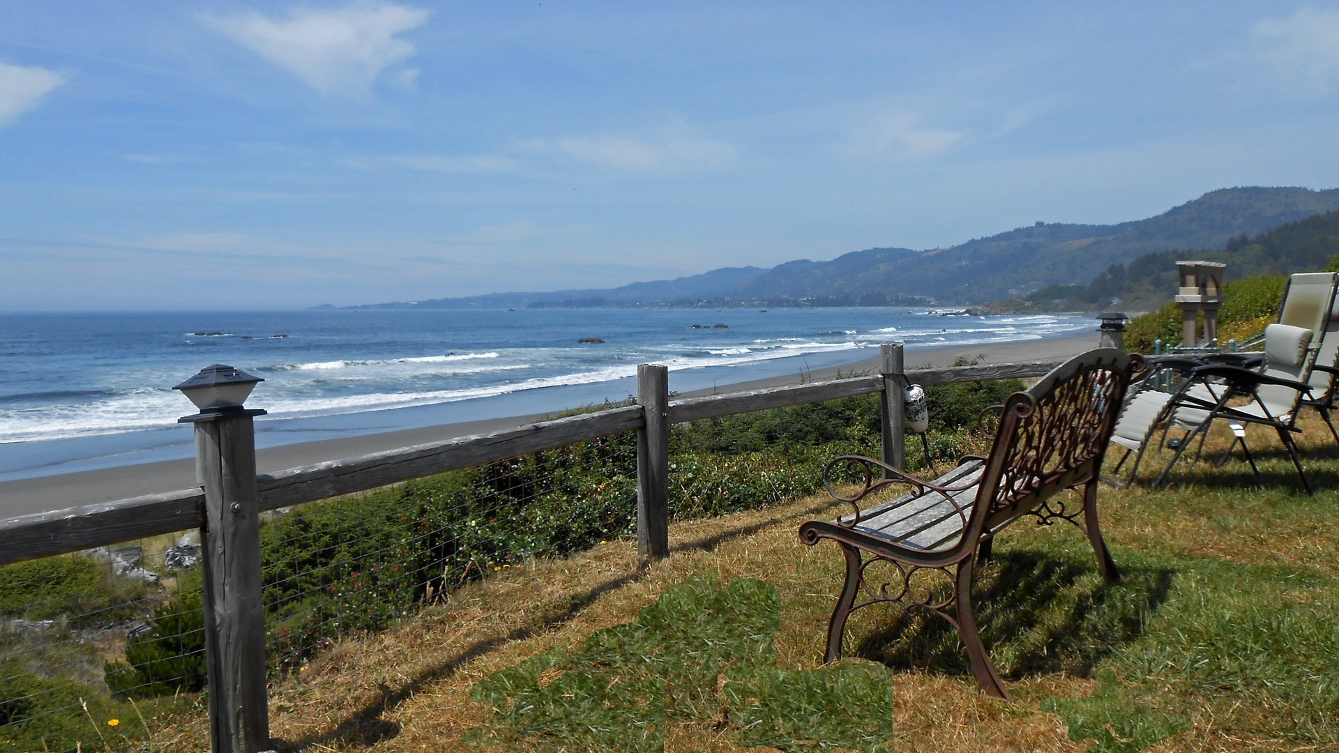 Iron bench overlooking the Pacific Ocean